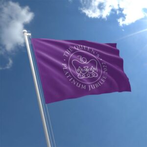 A flag for The Queen's Platinum Jubilee 2022 showing the official Platinum Jubilee Emblem on a purple ground