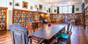 Conway Hall Library Room showing bookcases, tables and chairs