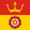 Hampshire flag: divided horizontally, a Tudor rose in white and red on yellow, below a gold coronet on red